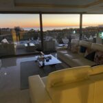 living room and view over sea from penthouse for sale in ferragudo